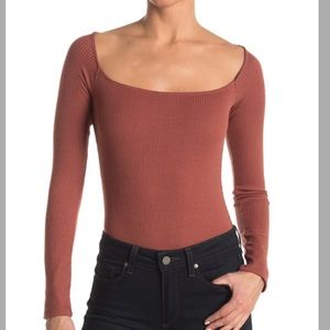 New with tags Long sleeved bodysuit